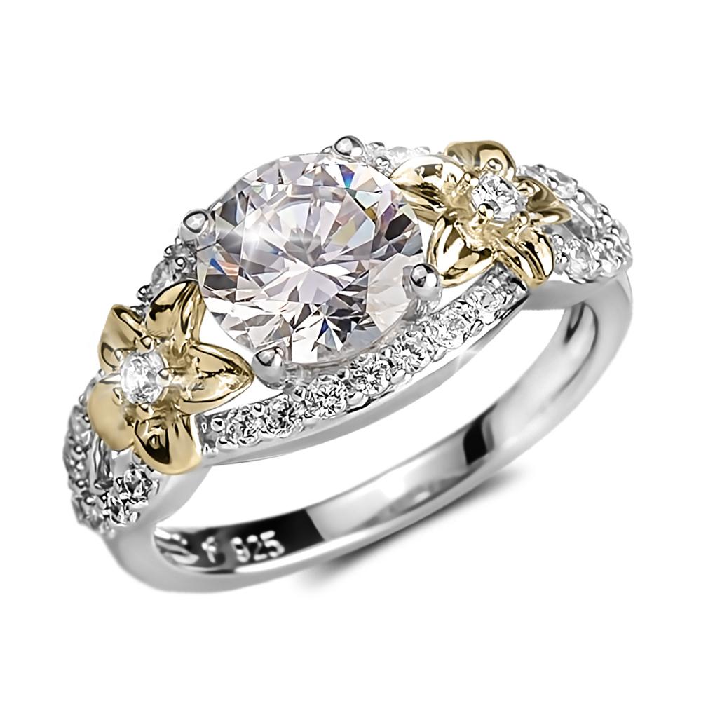 Floria Ring featuring a two-tone sterling silver band with a large round central gemstone surrounded by smaller stones and accented with gold floral details for women’s jewelry.