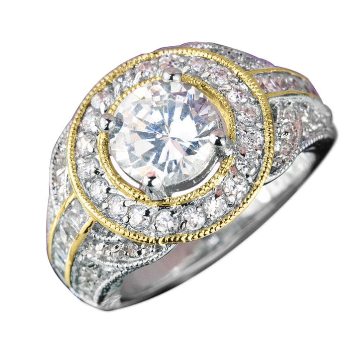 Bel-Air Ring featuring a two-tone sterling silver band with a large central clear stone surrounded by smaller stones, designed for women’s elegant jewelry collection.