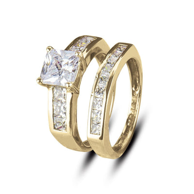 Lanai Duo Bridal Ring set in sterling silver with gold plating, featuring a princess-cut center stone and channel-set smaller stones along both bands designed for women.