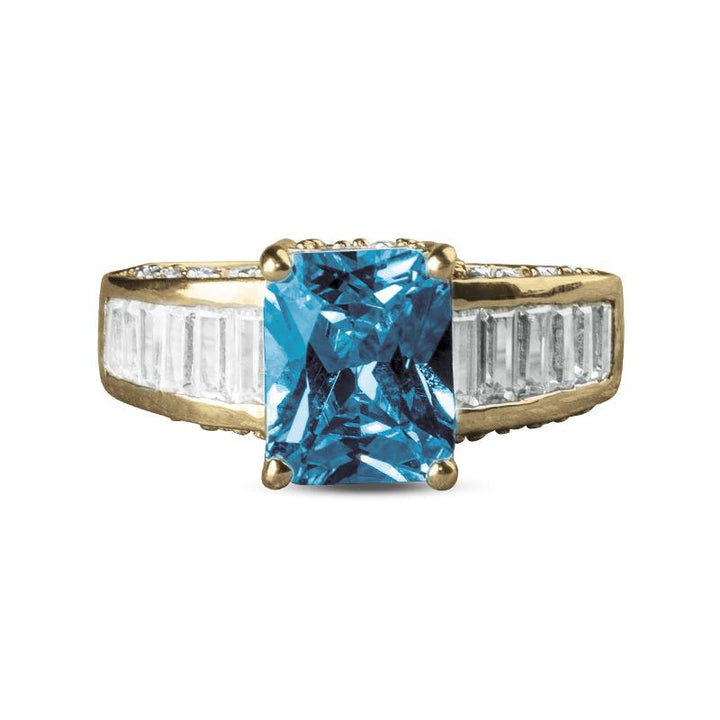Sonora Dress Ring featuring a large rectangular blue gemstone set in sterling silver with tapered baguette accents for an elegant female jewelry piece.