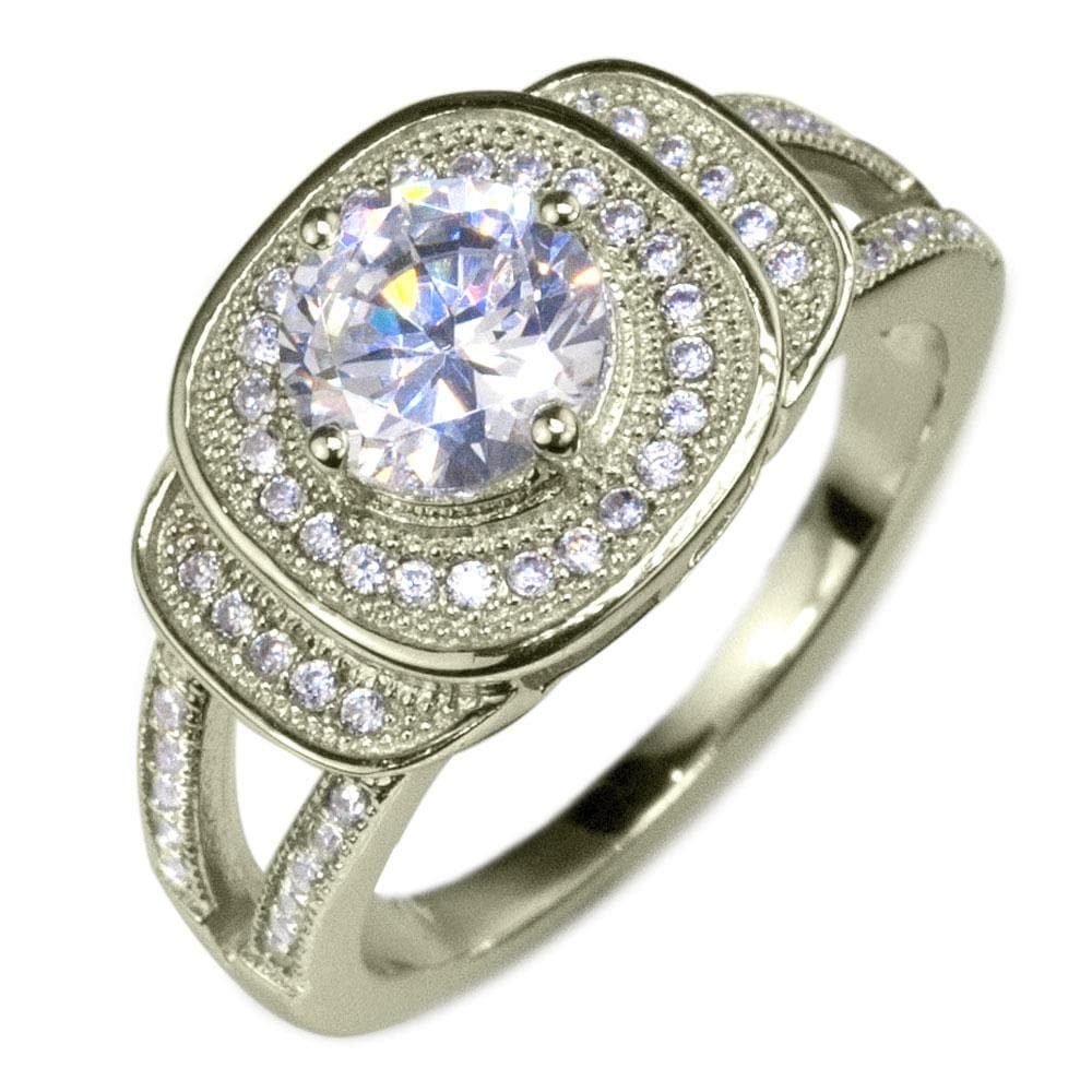 Isobella Rose Gold Ring crafted from sterling silver with rose gold plating, featuring a sparkling central gemstone surrounded by multiple smaller stones in an elegant design.