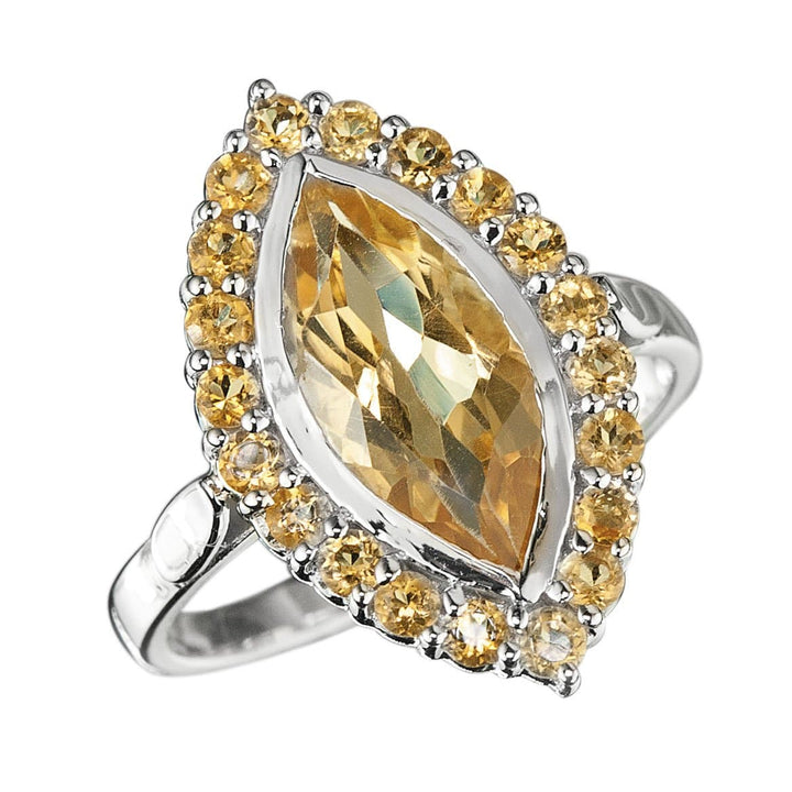 Citrine Solaris Ring featuring a marquise-cut citrine center stone surrounded by smaller round citrines, set in sterling silver for a dazzling jewelry statement.