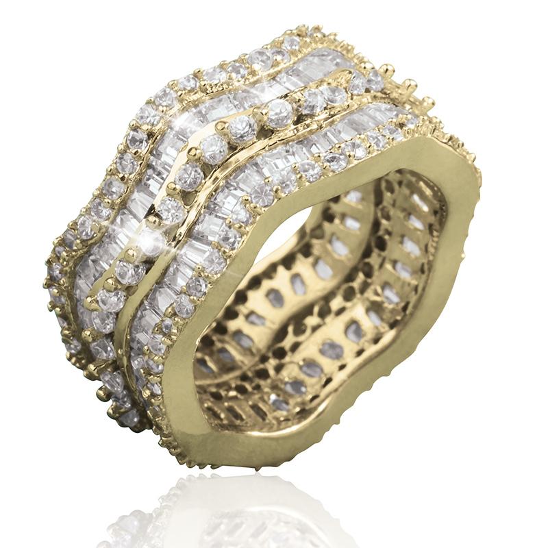 Endless Wave Eternity Ring featuring an elegant gold band with intricate wave design, set with sparkling clear gemstones for a timeless, feminine jewelry piece.