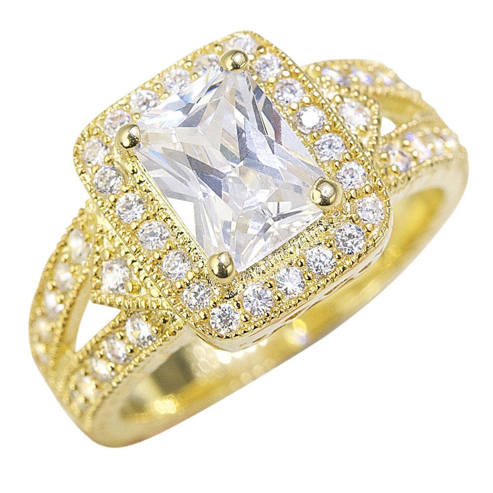 Siam Ring featuring a sterling silver band with gold plating, adorned with a large rectangular clear gemstone surrounded by smaller sparkling crystals, designed for women’s jewelry.