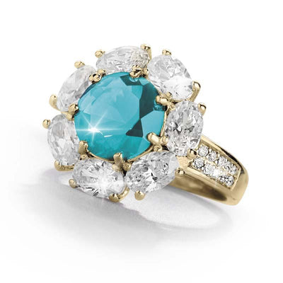 Glacial Cluster Ring featuring a large blue gemstone center surrounded by clear stones, crafted in sterling silver with gold plating, elegant female jewelry ring design.