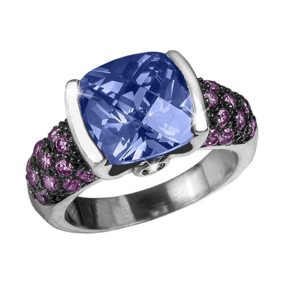 Rainforest Rhodium Ring featuring a sterling silver band with rhodium plating, set with a large blue cushion-cut gemstone and accented with small purple stones, designed for female jewelry.