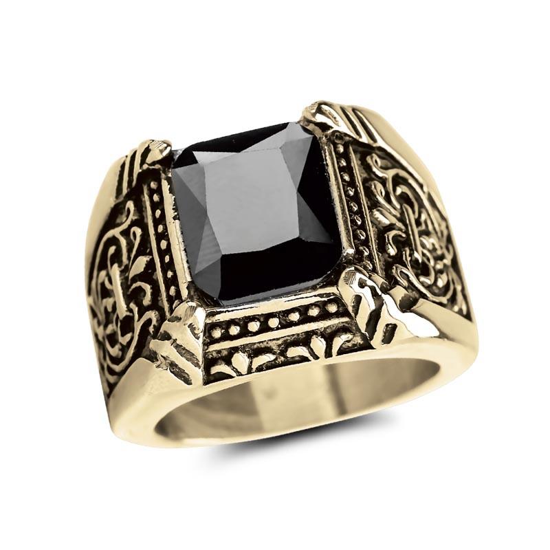 Caesar Nero Ring featuring a bold black stone set in gold-plated stainless steel with intricate vintage-style detailing, designed for men’s jewelry collections.