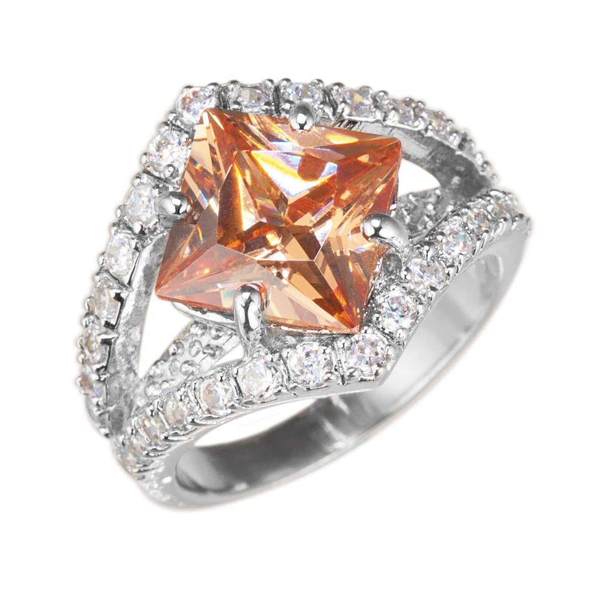 North Star Ring featuring a large square-cut amber gemstone set in sterling silver, accented with sparkling clear stones, designed for female jewelry collectors.
