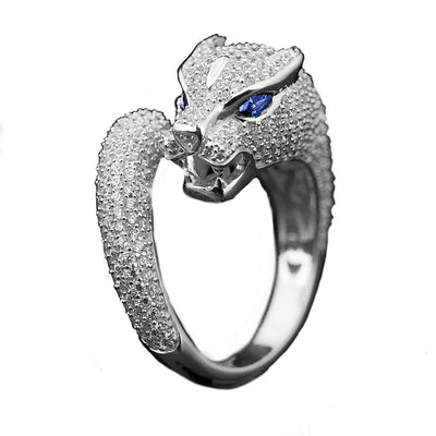 Panther Rhodium Ring featuring a sterling silver design with sparkling detailing and striking blue gemstone eyes, crafted for women seeking bold jewelry.