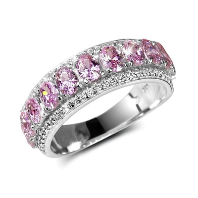 Blush Eternity Ring featuring sterling silver with rhodium plating, adorned with a row of sparkling pink gemstones, designed for women’s elegant jewelry collections.