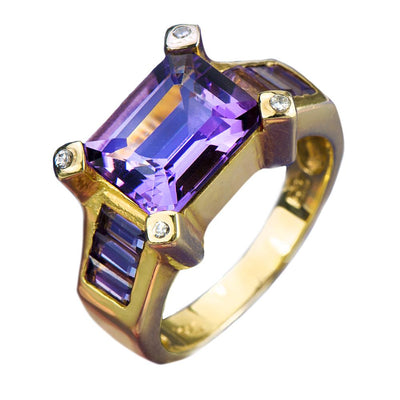 Cleopatra Amethyst Ring featuring a large rectangular amethyst centerpiece set in sterling silver with gold plating, accented by small clear gemstones, designed for women’s jewelry.