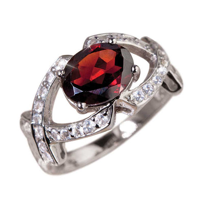 Rioja Garnet Ring featuring a deep red garnet centerpiece set in sterling silver with sparkling accent stones, designed for women’s jewelry collections.