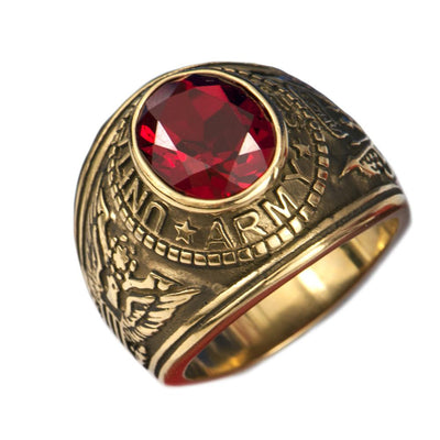 Army Ring crafted from gold-plated stainless steel featuring a large red gemstone and detailed military-inspired engravings, designed for men’s jewelry collection.