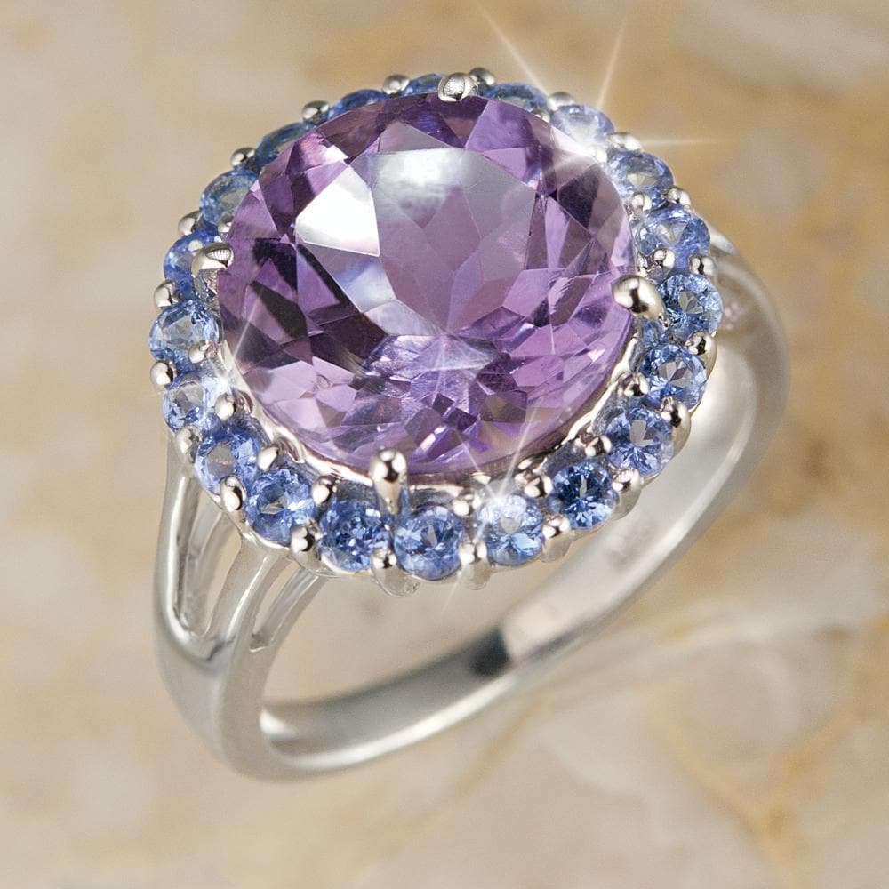 Amethyst & Tanzanite Cocktail Ring featuring a large round amethyst center stone surrounded by smaller tanzanite stones set in sterling silver with rhodium plating, designed for women.